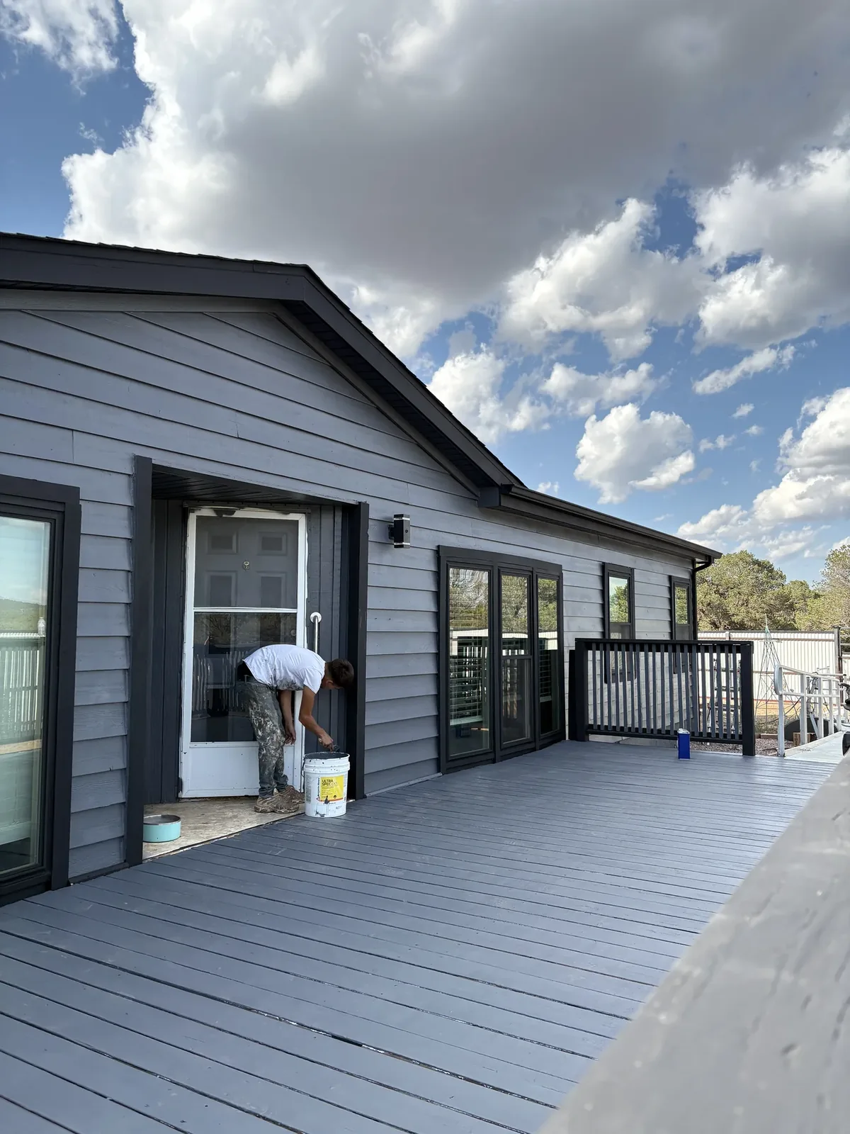 Deck after restoration, sanded and re-stained boards