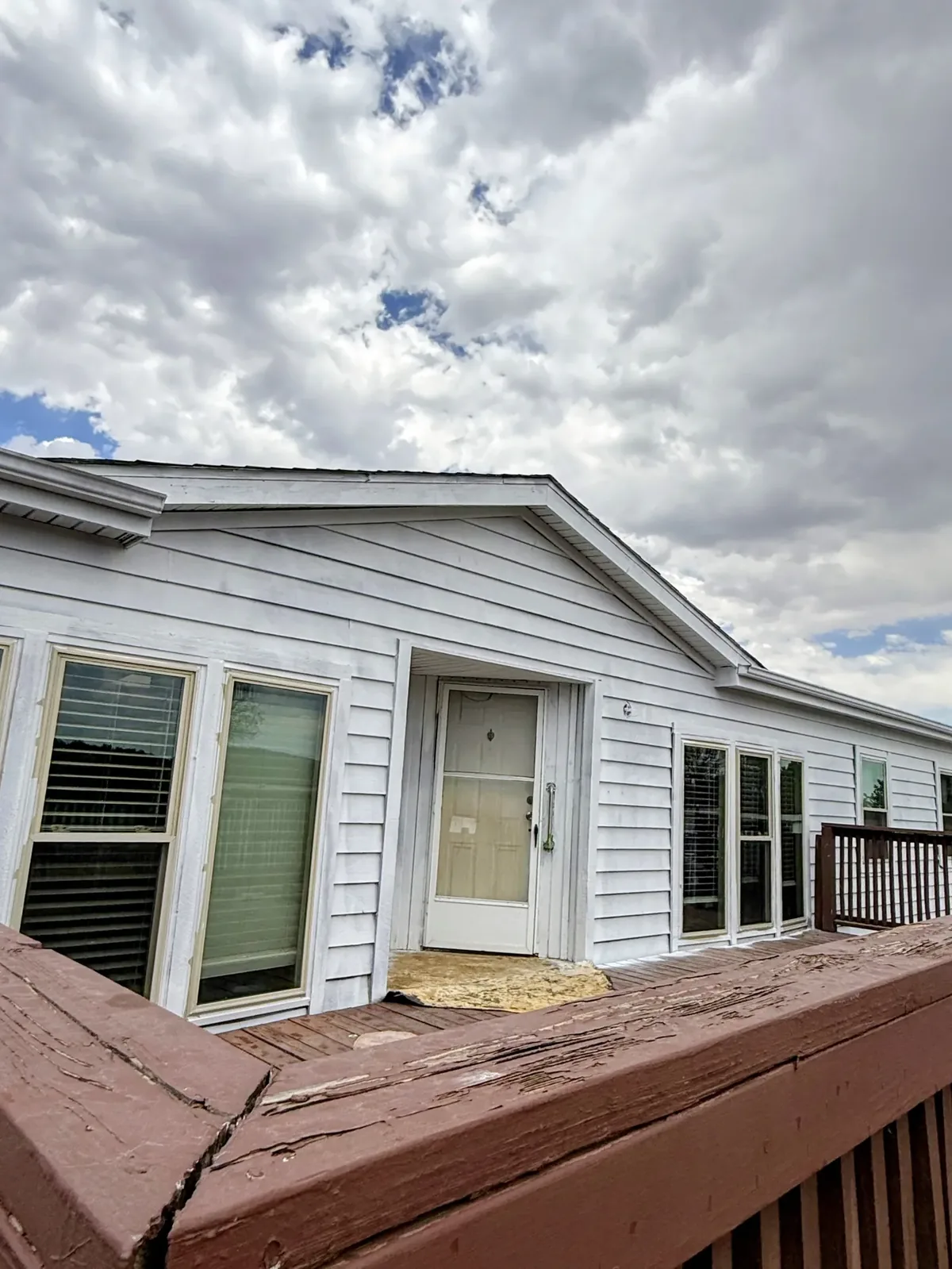 Small commercial building exterior with a fresh, even coating and clean trim