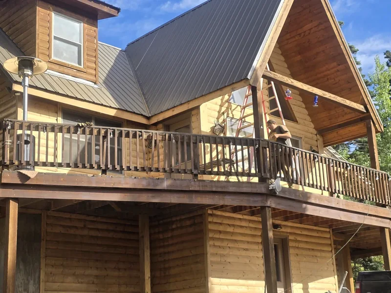 Restored log home with freshly sealed and stained timber walls
