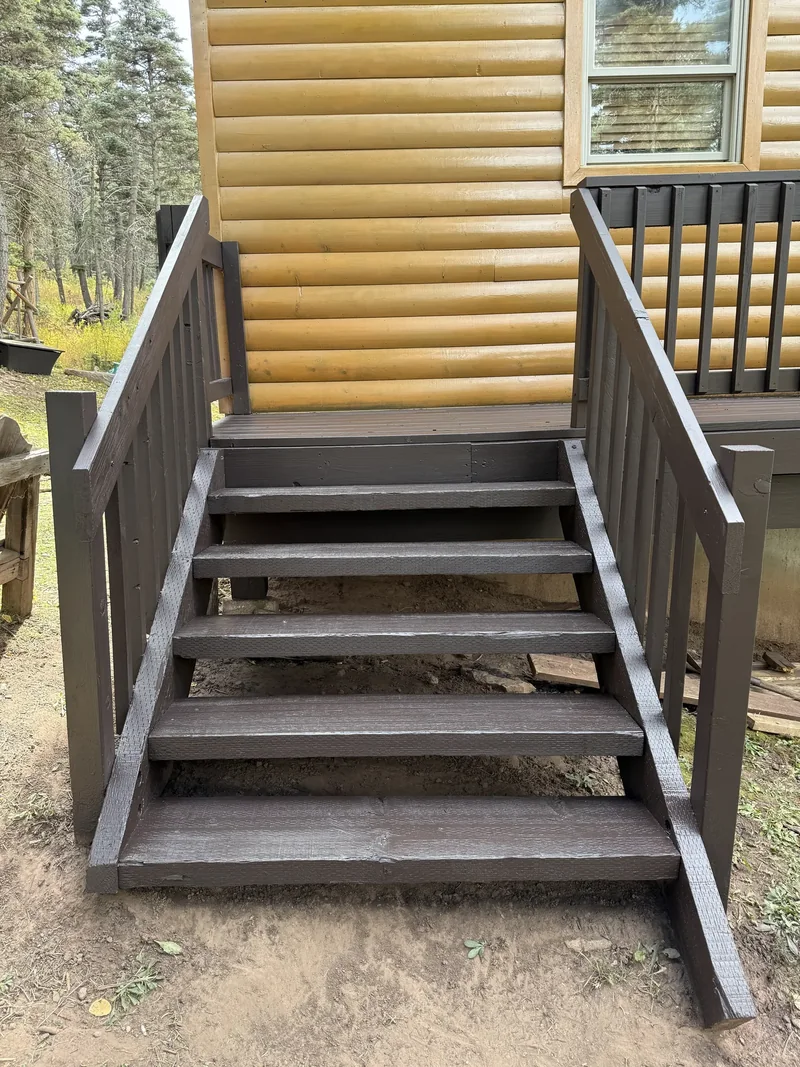 Cedar privacy fence coated with a rich protective stain